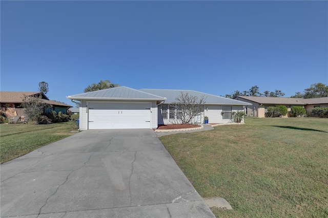 ranch-style home with a front lawn and a garage