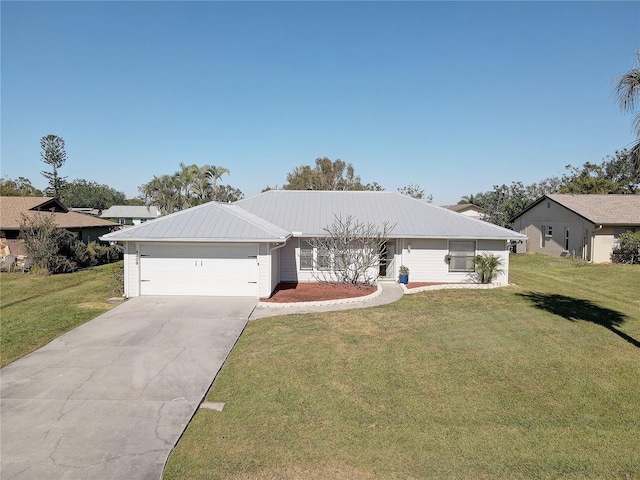 ranch-style home with a garage and a front lawn