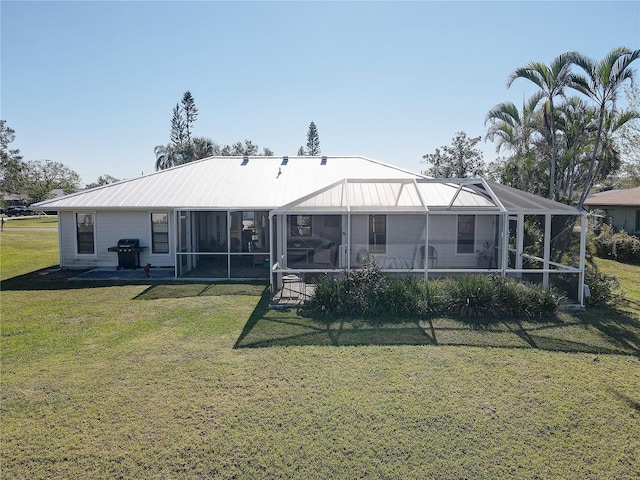 back of house with a yard