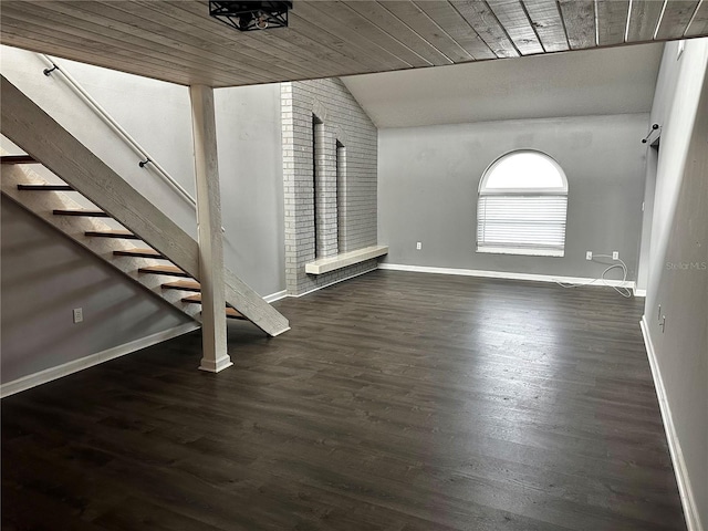 interior space with wood ceiling, dark wood-type flooring, and lofted ceiling