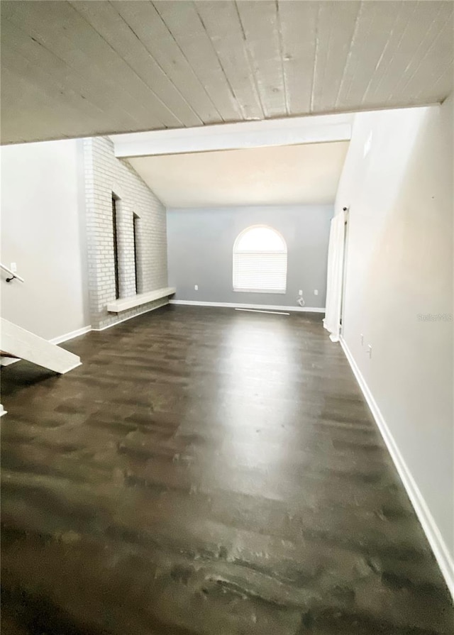 9107 Lingrove Rd, Weeki Wachee, FL 34613 - bonus room with wood ceiling, lofted ceiling with beams, baseboards, and wood finished floors