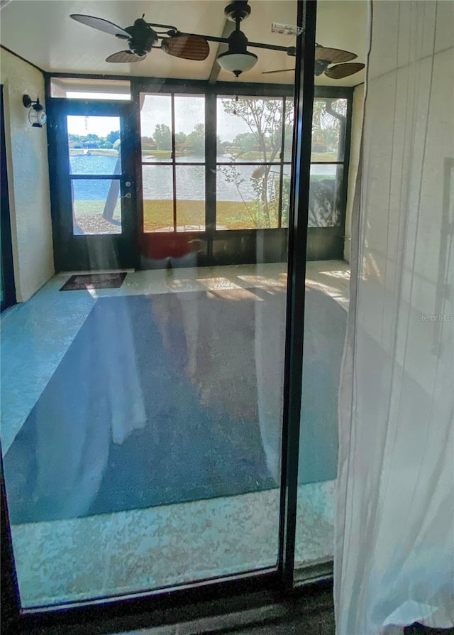 9107 Lingrove Rd, Weeki Wachee, FL 34613 - interior space with a water view and ceiling fan