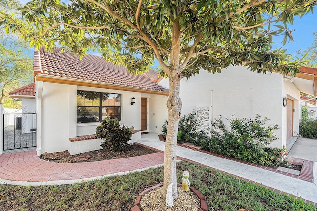 mediterranean / spanish-style house featuring a garage