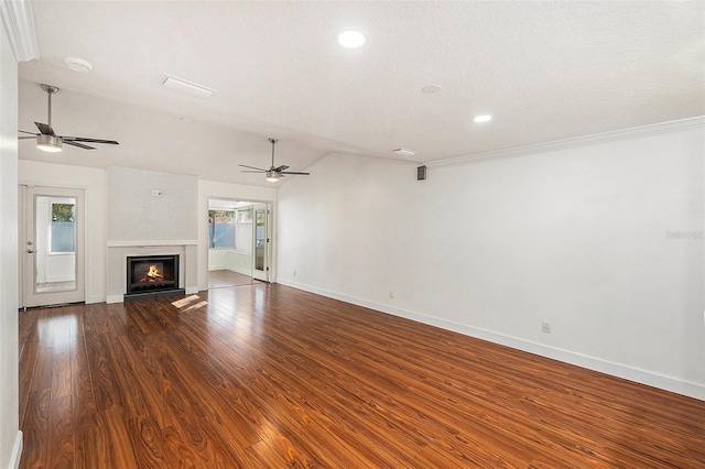 unfurnished living room with hardwood / wood-style floors, a textured ceiling, and ceiling fan