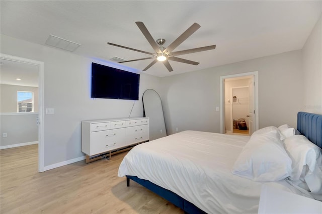 bedroom featuring ceiling fan and light hardwood / wood-style floors