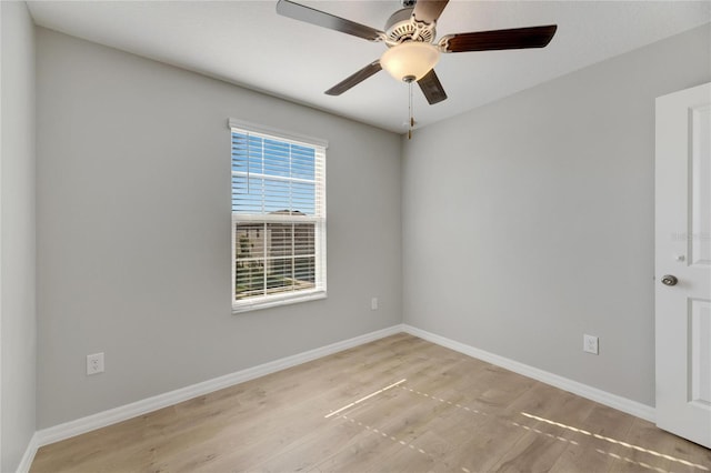 unfurnished room with light wood-type flooring