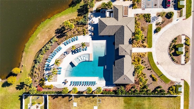 birds eye view of property featuring a water view