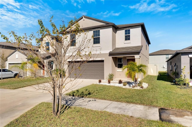 front of property with a garage and a front lawn