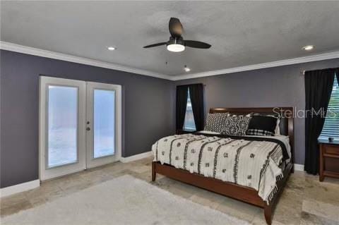 bedroom featuring ceiling fan, ornamental molding, access to outside, and french doors