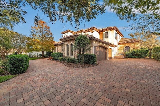 view of front of home with a garage