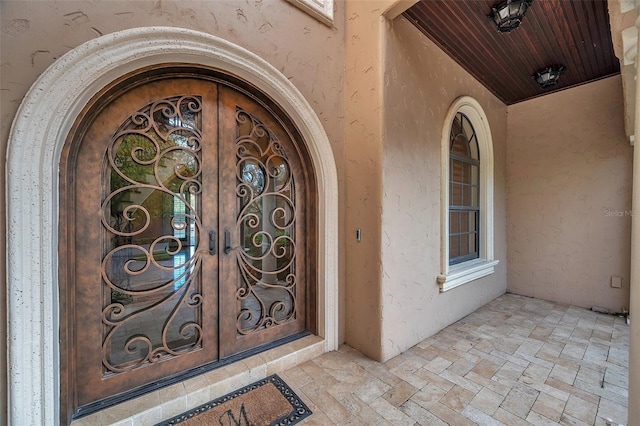 doorway to property with french doors