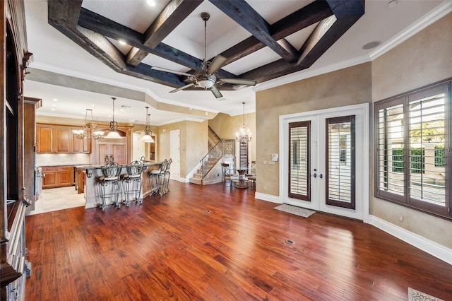 interior space with beamed ceiling, dark hardwood / wood-style flooring, and coffered ceiling