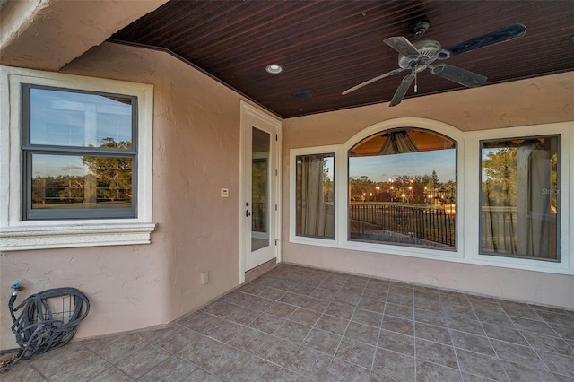 view of patio featuring ceiling fan