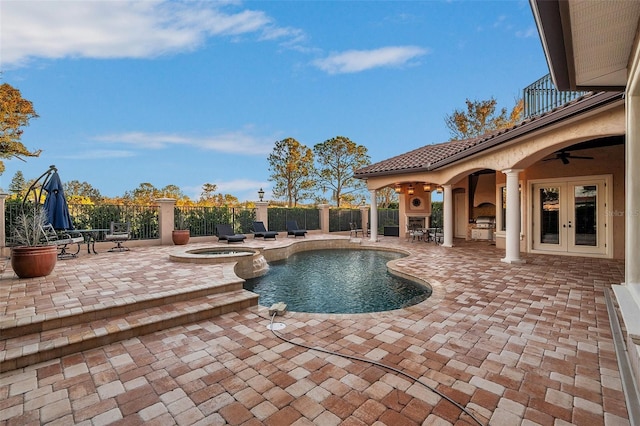 view of pool featuring french doors, ceiling fan, an in ground hot tub, area for grilling, and a patio