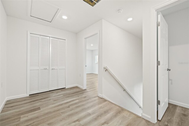 hallway featuring light wood-type flooring