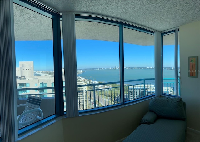 sunroom with a water view