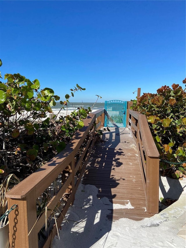 view of community with a water view