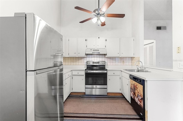 kitchen with white cabinets, sink, stainless steel appliances, and tasteful backsplash