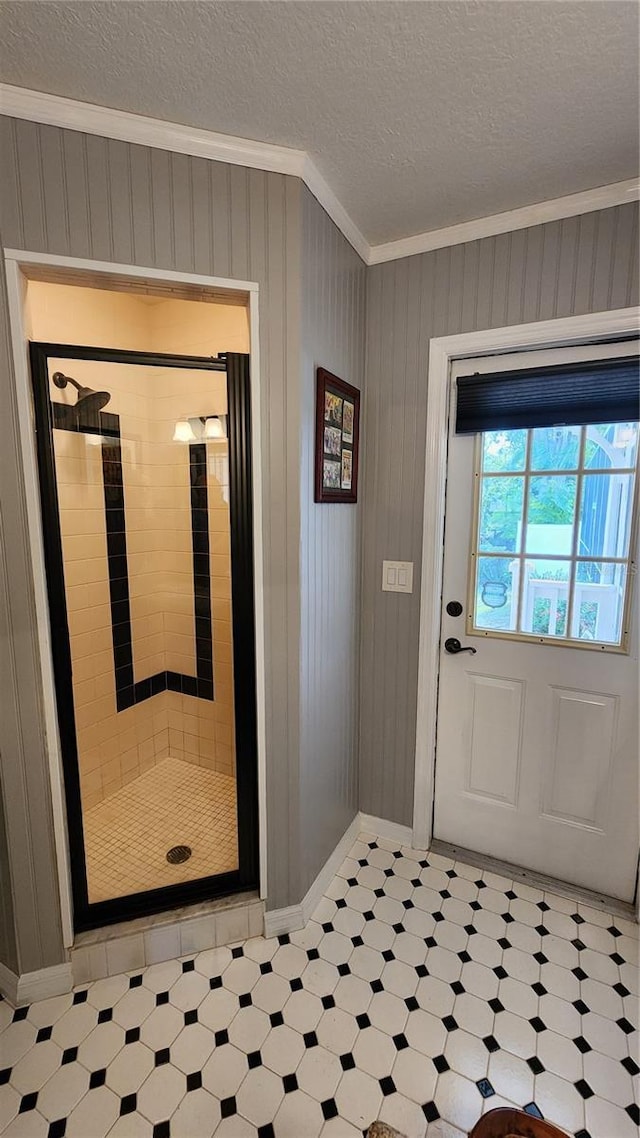 doorway featuring ornamental molding