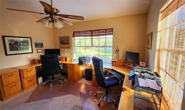 carpeted office with ceiling fan