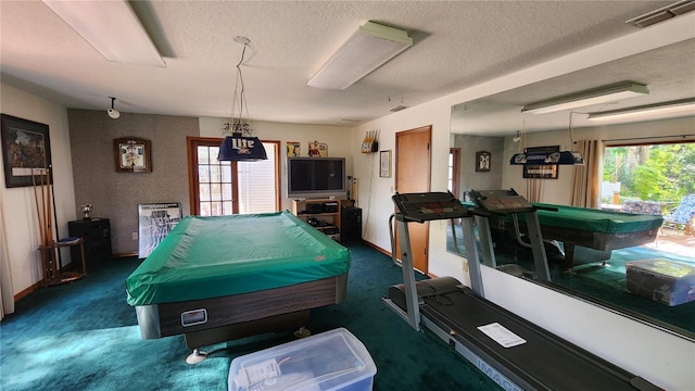 recreation room featuring dark colored carpet, a textured ceiling, and billiards