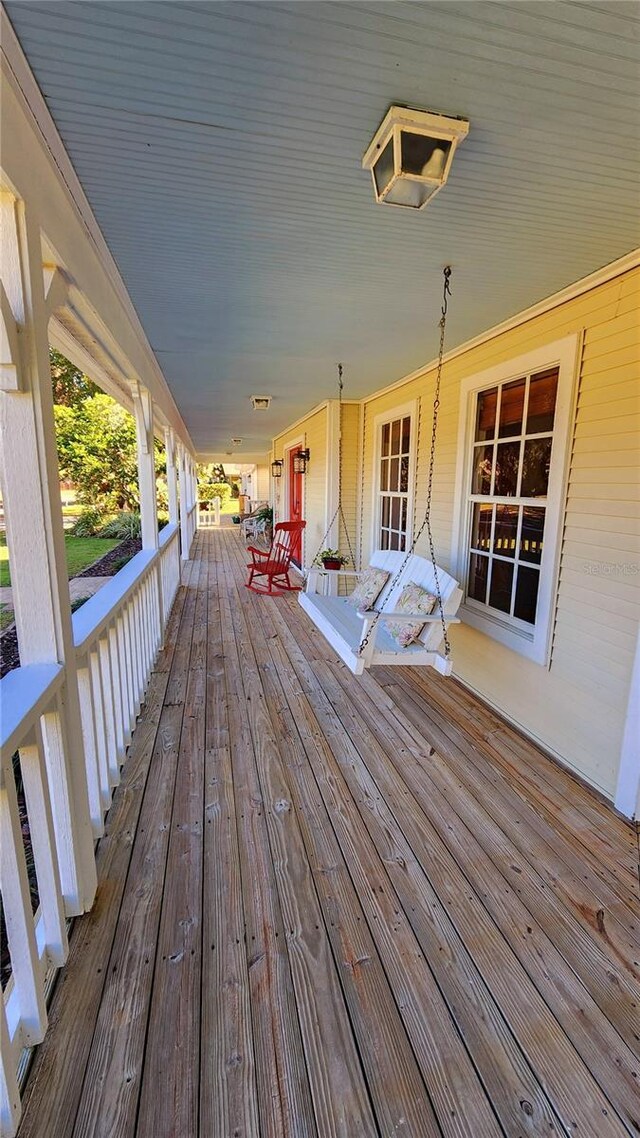 wooden terrace with covered porch