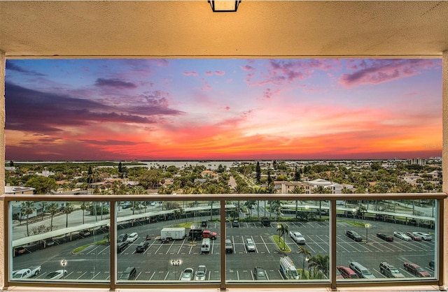 view of balcony at dusk