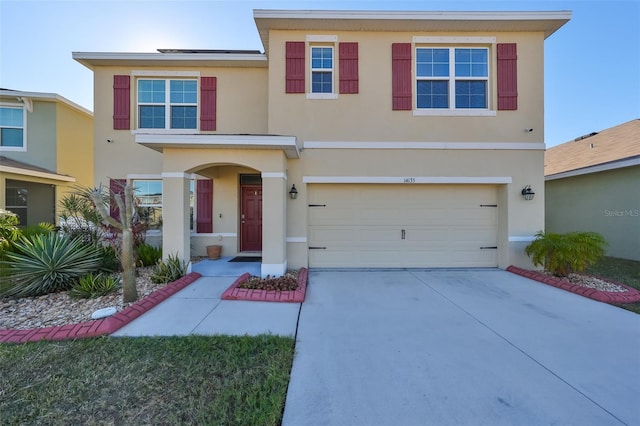 view of front of property featuring a garage