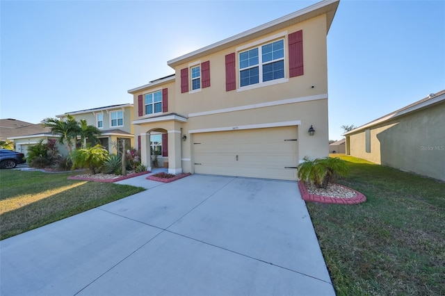 view of front of property featuring a front lawn and a garage