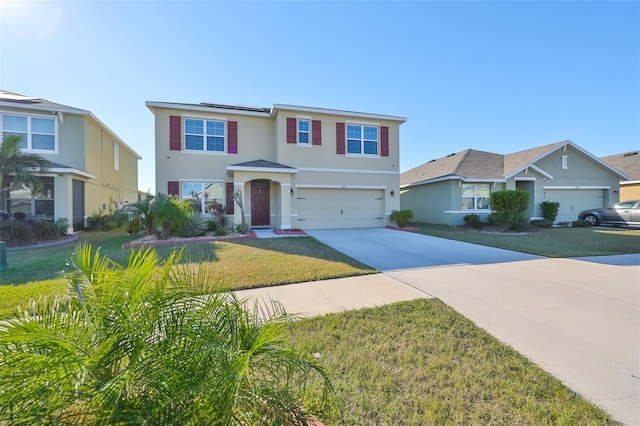 view of front of house with a garage and a front lawn