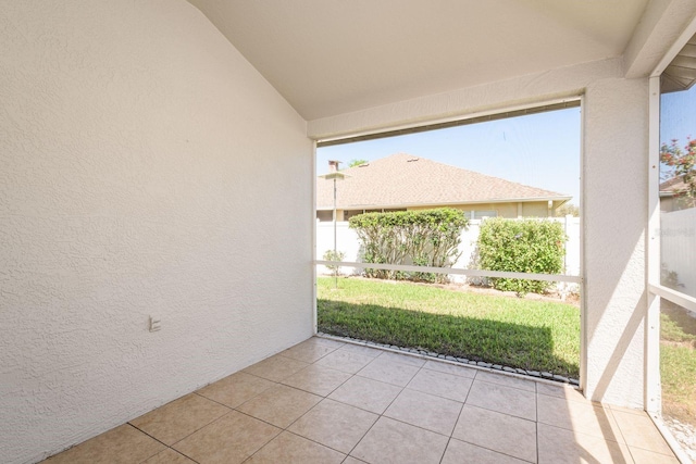 view of patio featuring fence