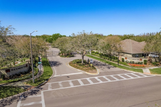 exterior space featuring curved driveway