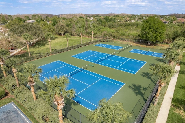 view of sport court with fence