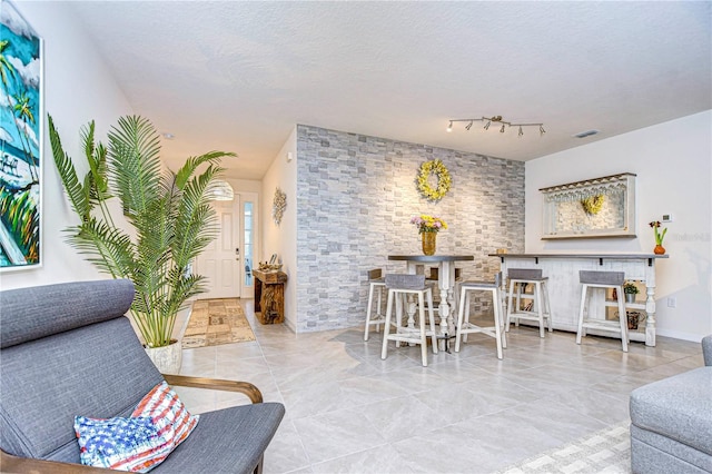 interior space with a textured ceiling