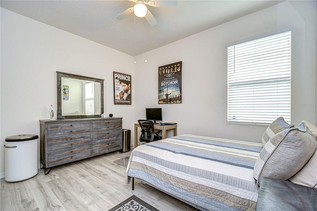 bedroom featuring light wood-type flooring and ceiling fan