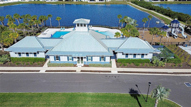 birds eye view of property featuring a water view