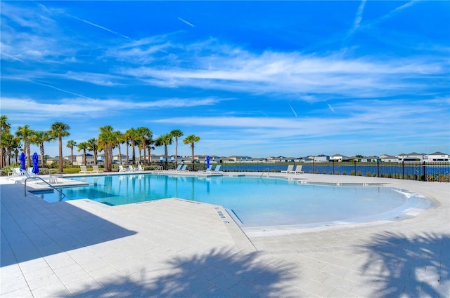 view of swimming pool featuring a patio area