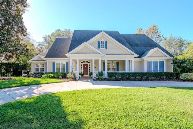 view of front of property with a front lawn and a porch