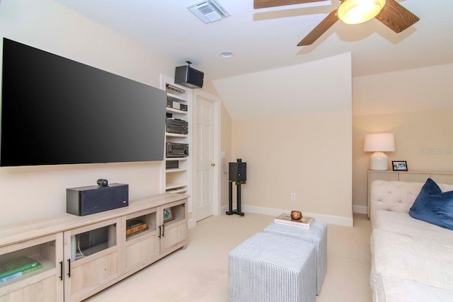 living room with light colored carpet, ceiling fan, and lofted ceiling