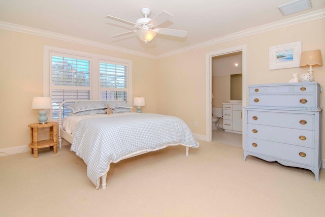 carpeted bedroom featuring ceiling fan and crown molding