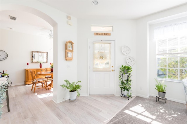 entrance foyer featuring light hardwood / wood-style flooring and ceiling fan