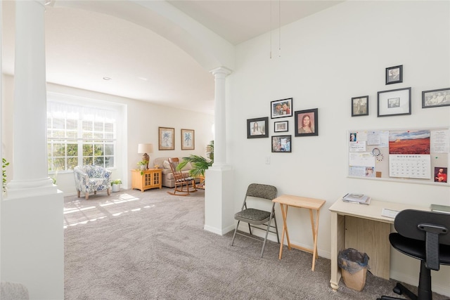 office with carpet flooring and decorative columns