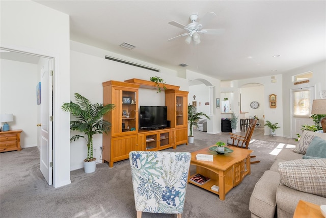 living room with ceiling fan and light carpet