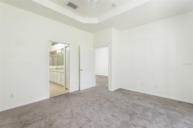 5733 Heronpark Pl, Lithia, FL 33547 - unfurnished bedroom featuring carpet and ensuite bath