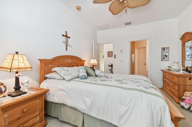 bedroom featuring light carpet and ceiling fan