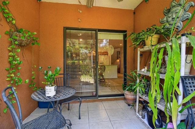 entrance to property featuring a patio area