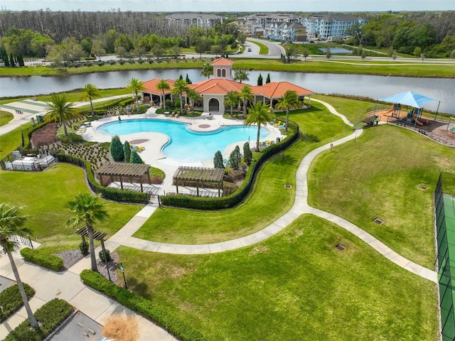 view of pool with a water view