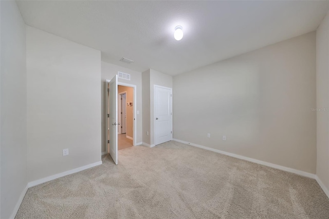 empty room with light carpet