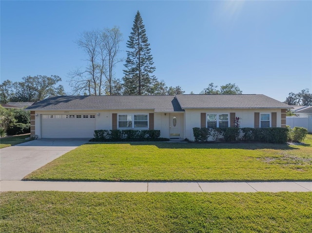 single story home featuring a front yard and a garage