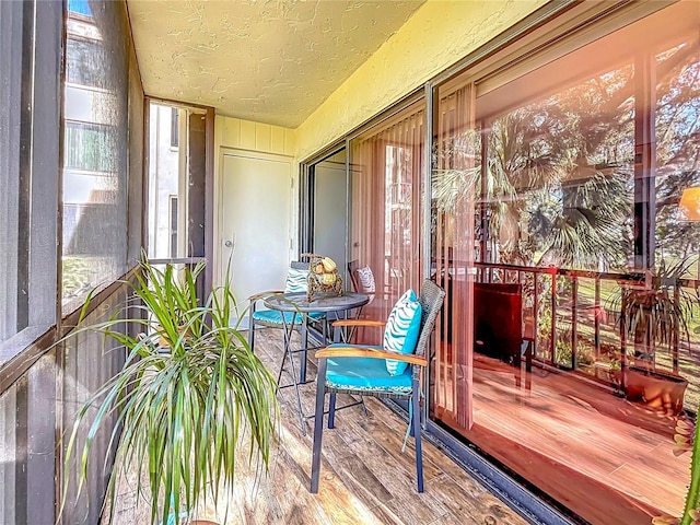 sunroom / solarium featuring a healthy amount of sunlight